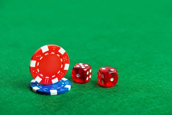 Roulette table showing live wheel action and betting layout Live roulette wheel spinning with betting chips placed on numbers and colors
